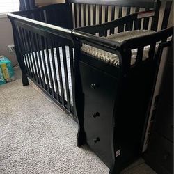 Baby crib with changing table and mattress included