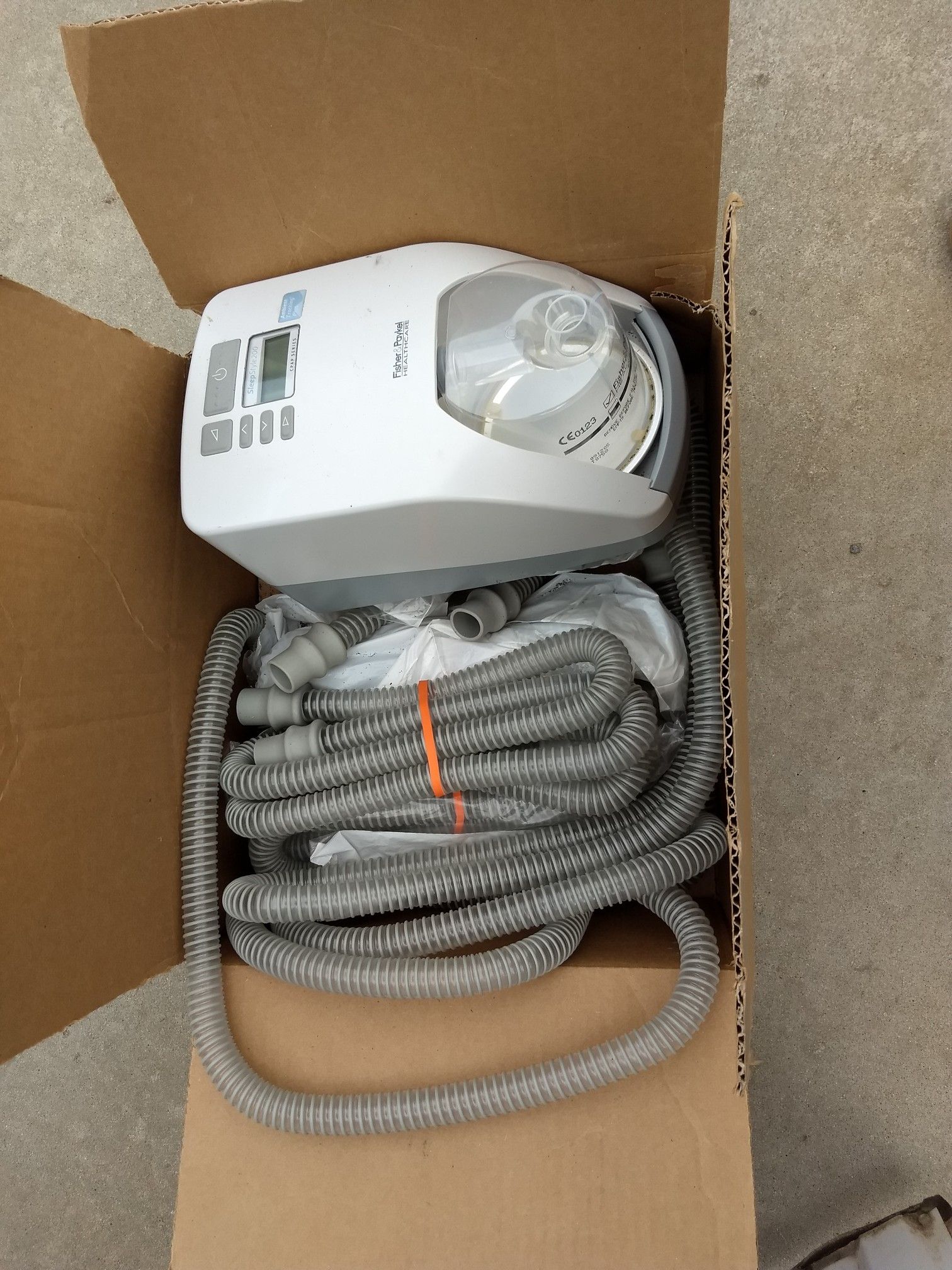 CPAP machine with extra hoses slightly used to see if it worked I am trying to locate the AC cord