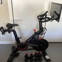 Lightly used Peloton with shoes and weights
