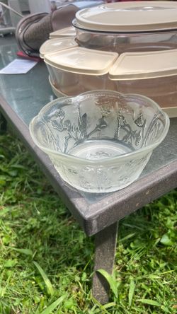 vintage frosted and clear glass bowl featuring an embossed floral or botanical design, consistent with tableware produced by KIG Indonesia.