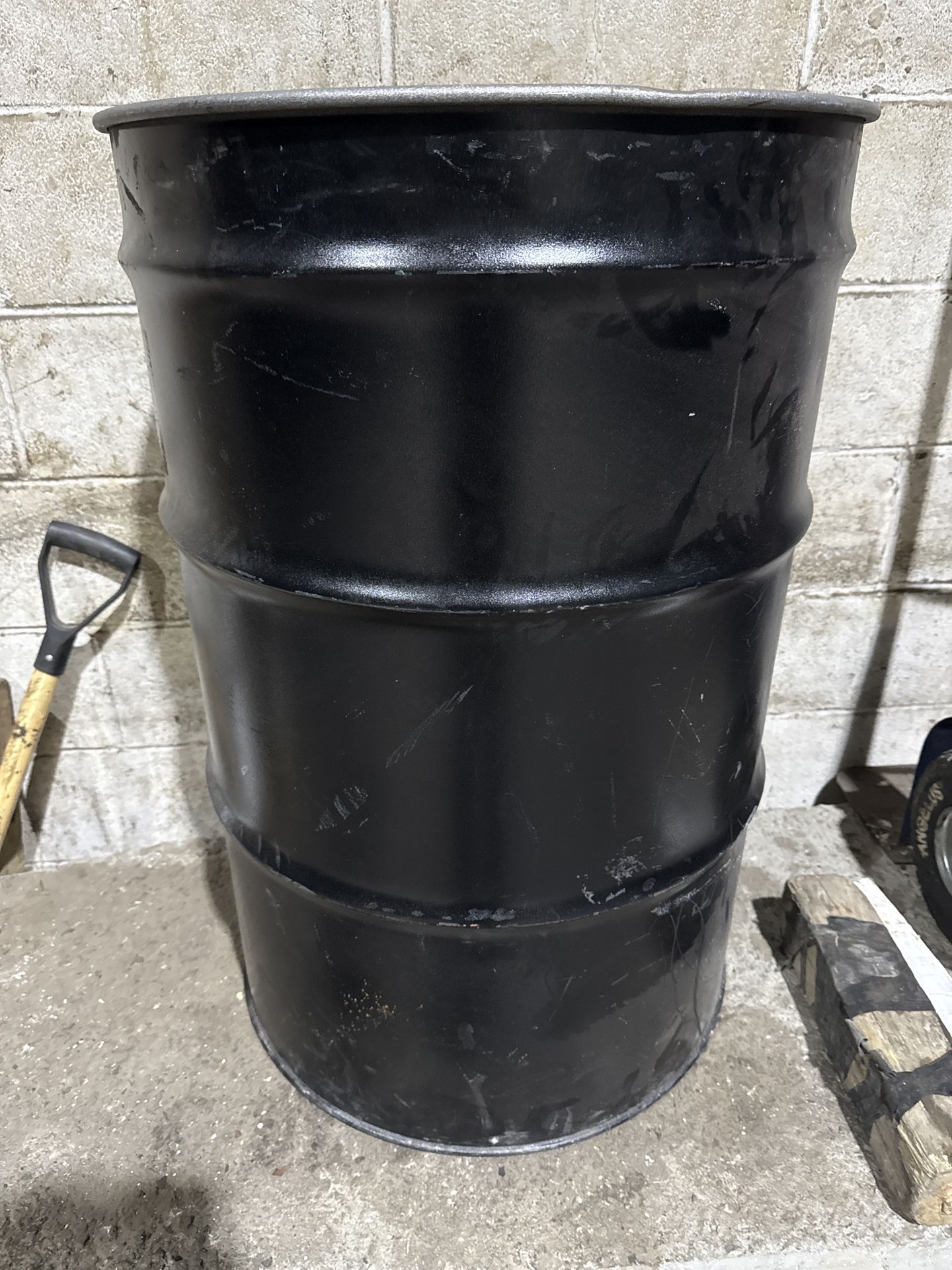 Barely Used Black Colored 55 Gallon Metal Drum