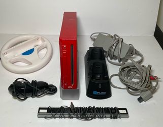 Red Wii with accessories tested works