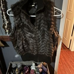 Very Cute  Puffy Vest Size Medium More Like A Small Only Five Dollars