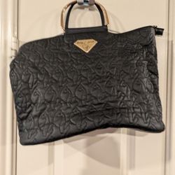 Vintage Black Baby Phat Purse 
Gold handle detail can be hand bag or over the shoulder strap. striped inside and pillow detail of trademark cat.