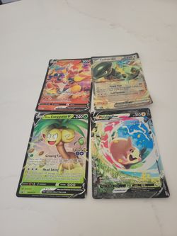 4 big Pokemon cards