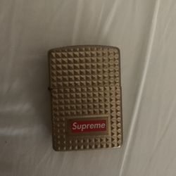 SUPREME Diamond Cut Gold Zippo