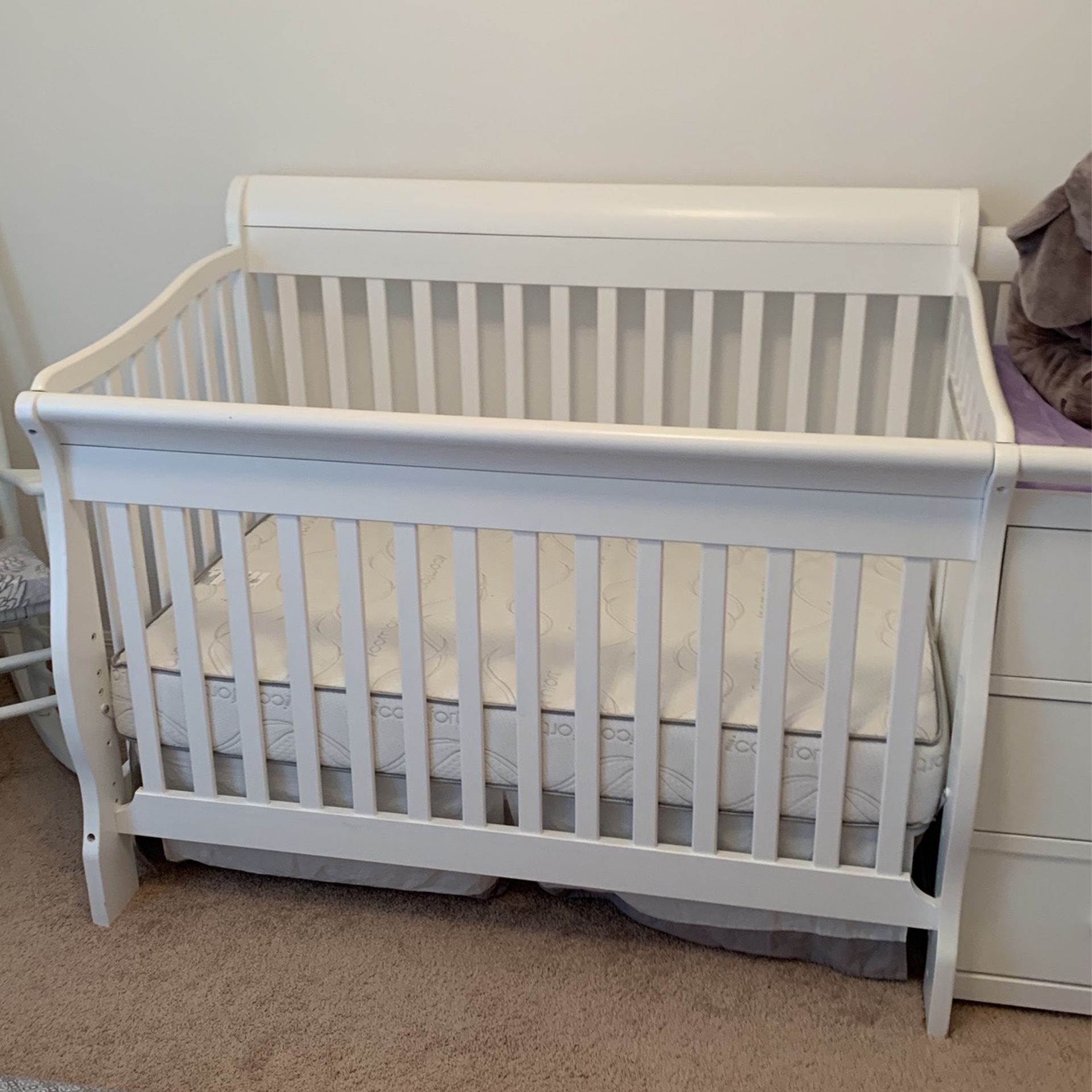 White Crib With Changing Table, Side Storage and Brand New Mattress For Sale For $200