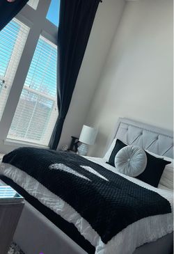 Queen Upholstered Bed