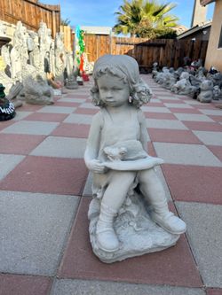 New little girl made out of cement