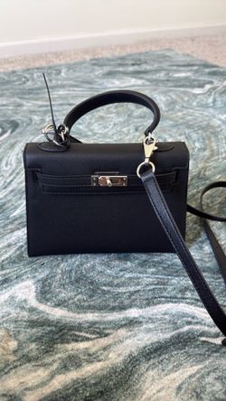 Black and silver handbag