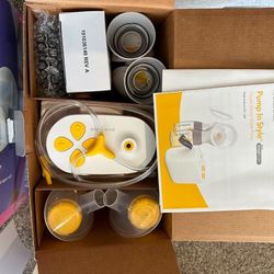 Breast Pump, medela + Stay Dry Nursing Pads (200+)