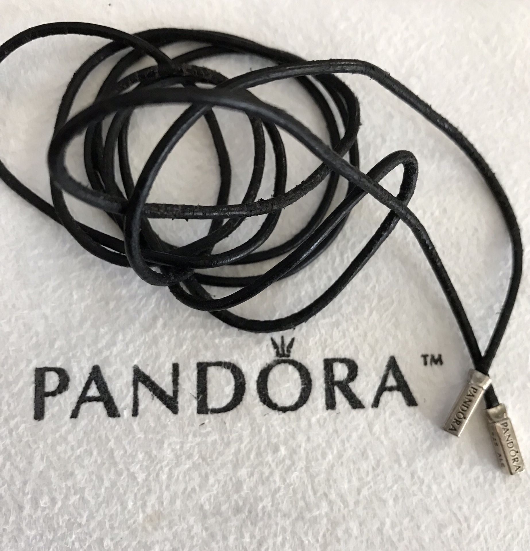 Black leather Pandora lariat with silver tips; discontinued item