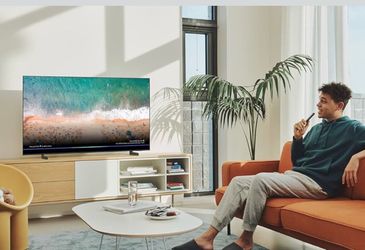Samsung 70” Smart 4K TV + Full Motion Wall Mount - $325