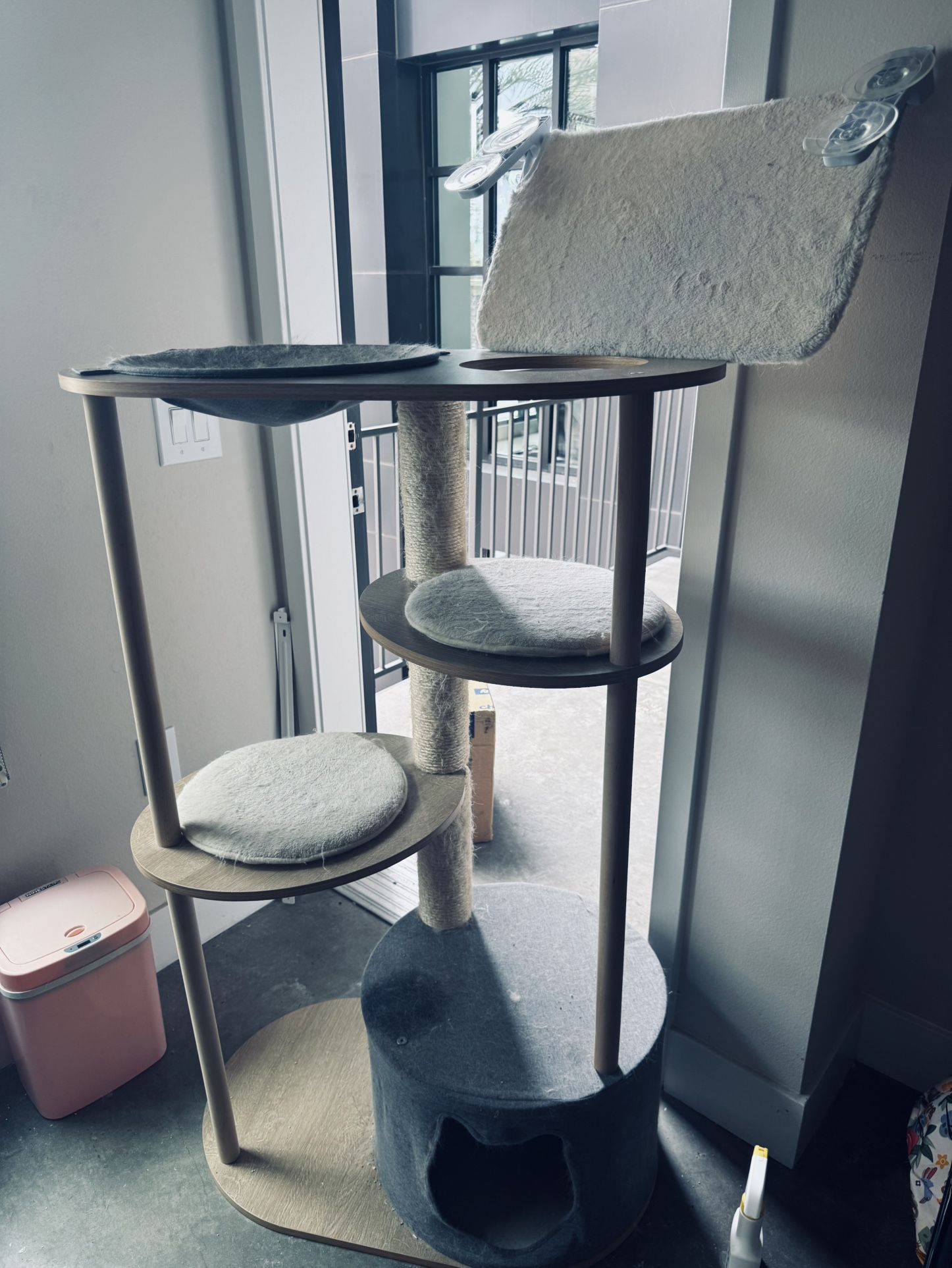 cat tree and glass wall mounted perch bed