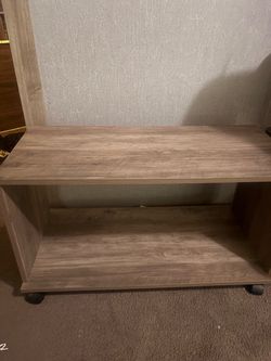 Rolling Wood-Look TV Stand with Shelf