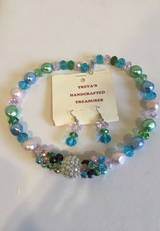 TREVA’S HANDCRAFTED TREASURES magnetic lock necklace and earrings.