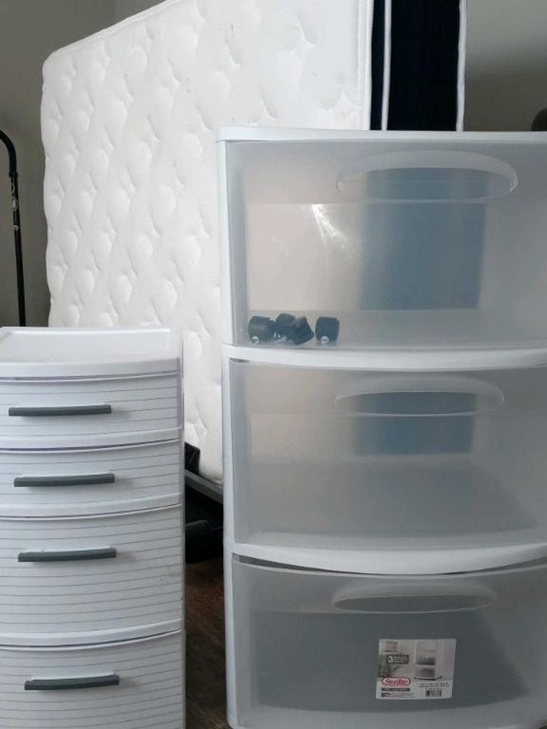 2 White Plastic Cabinets