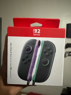 Switch 2 light purple and green joy cons