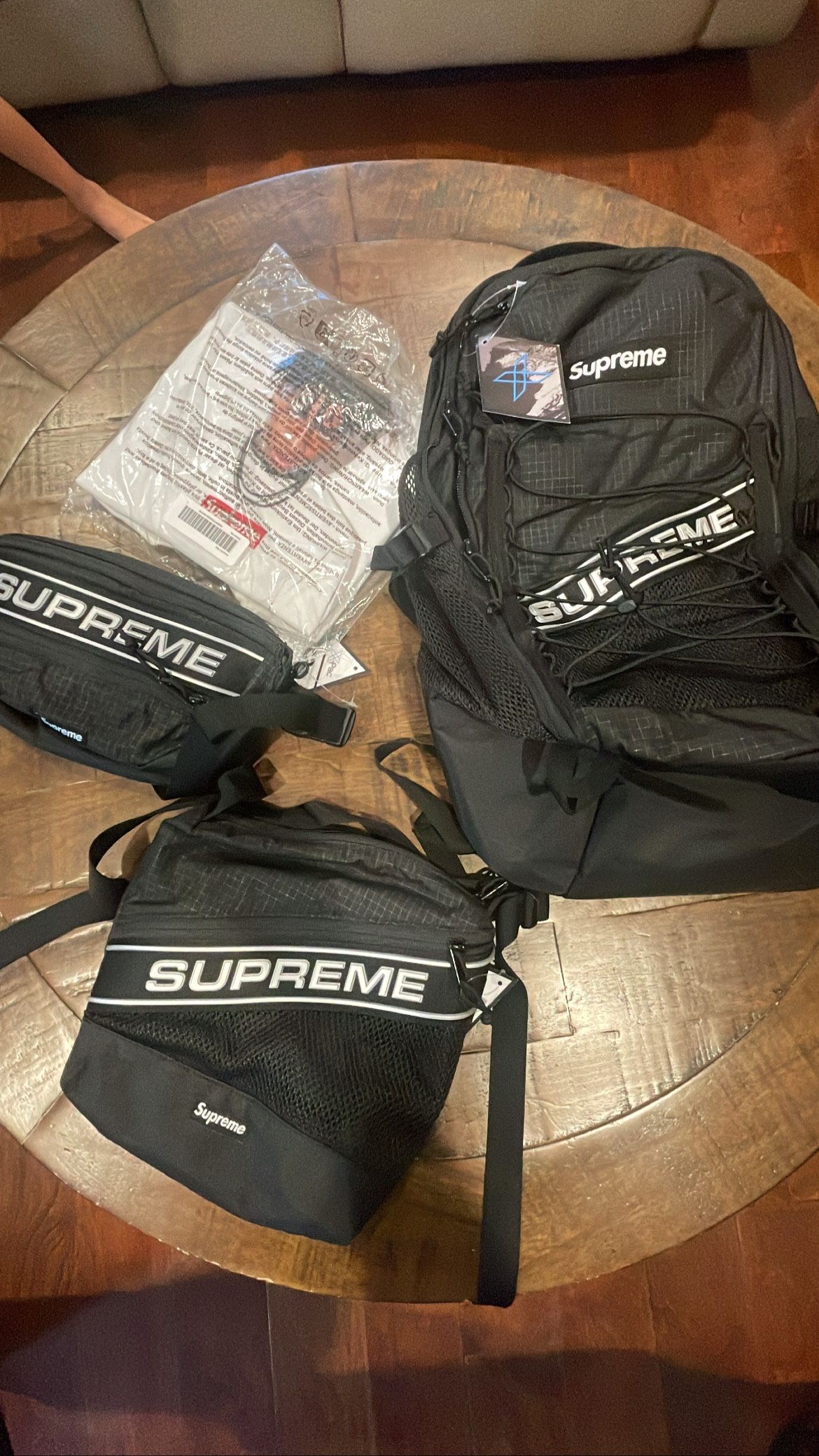 Supreme week 1 FW 23’ NBA Youngboy L tee, Waist bag, Shoulder bag, & Backpack.