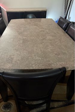 Real Marble table, 6 chairs and a buffet Marble table, 6 chairs and a buffet