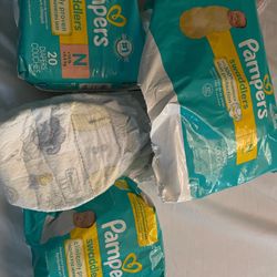 Pampers And Huggies Size N Diapers