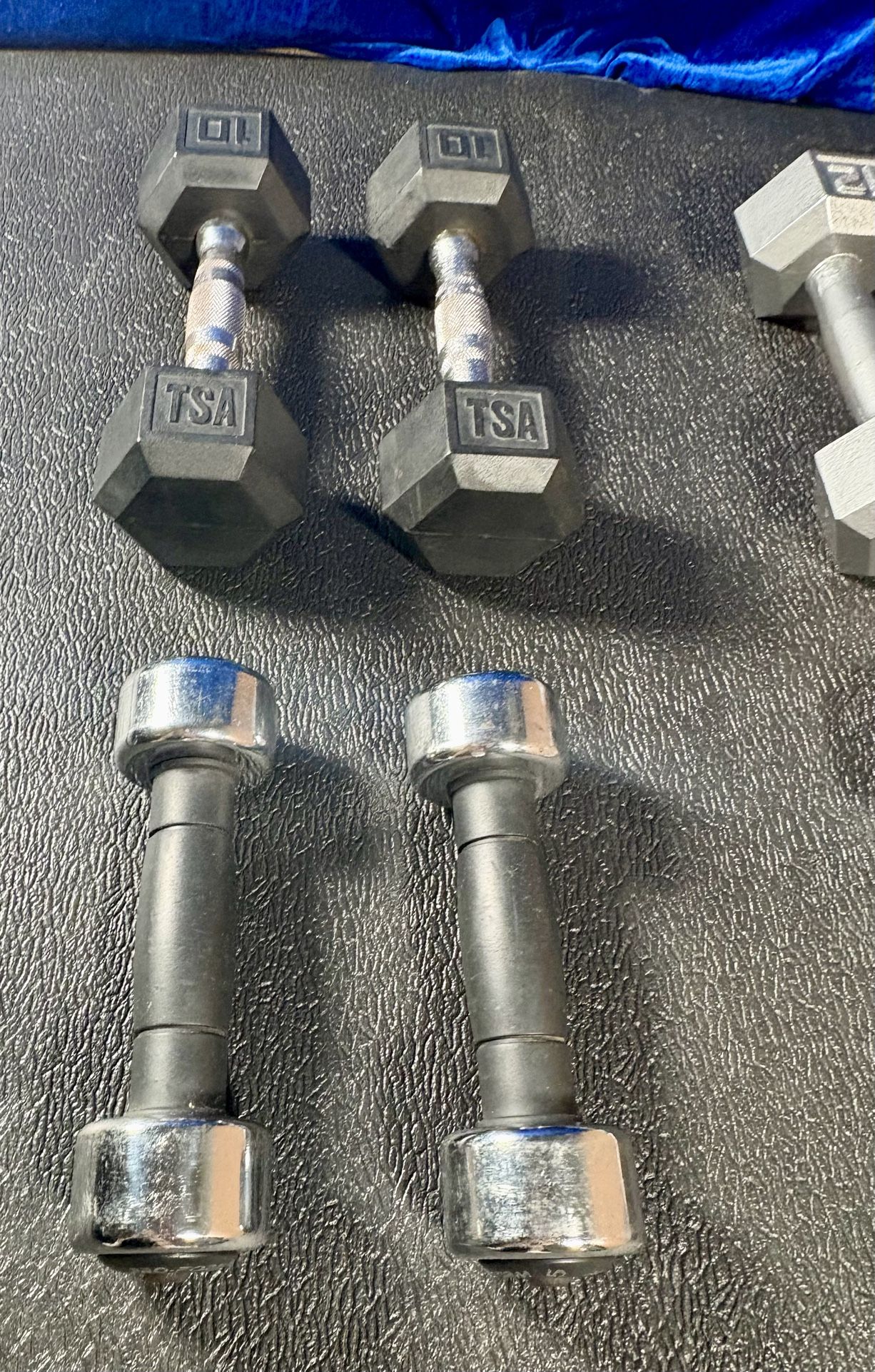 Set of Hex Cast Iron Dumbbells ( light) 12#, 10#, 8# and 5 #   In total: 70 pounds.