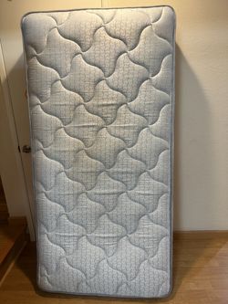 Free Twin Size Quilted Mattress with brand new bedsheets