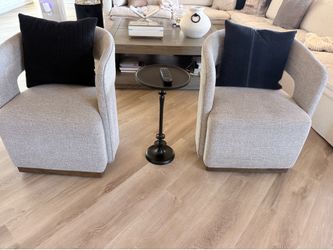 Two Swivel Chairs