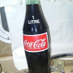 Vintage 1 litre Coca-Cola unopened bottle