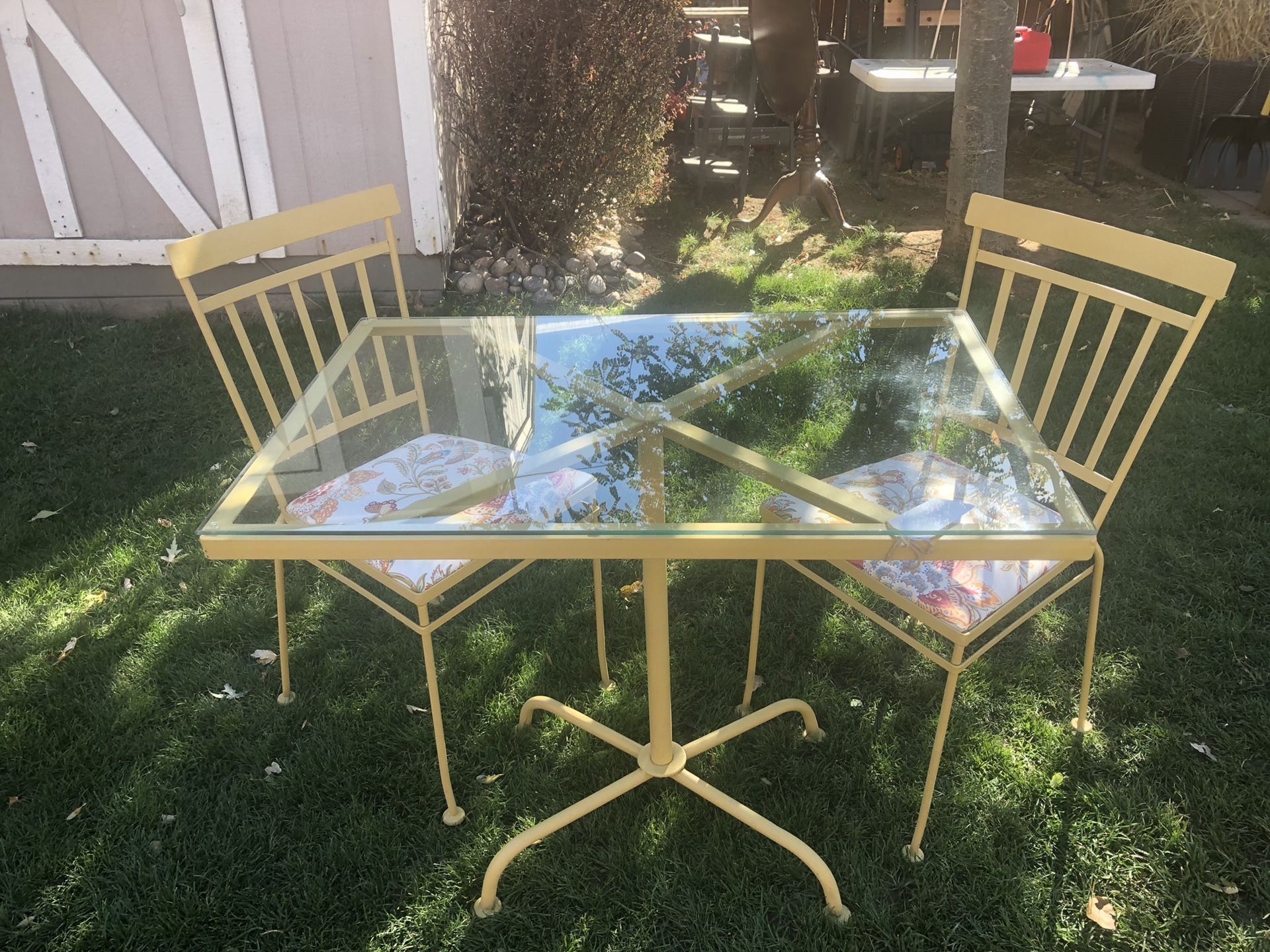 Vintage patio furniture: glass top wrought iron table and 2 chairs