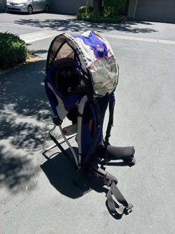 Kelty child carrier hiking