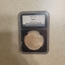 1883 O Morgan Silver Dollar.  Graded 
