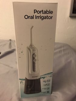 Portable water flosser