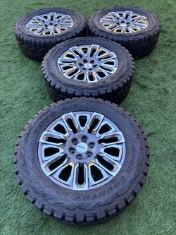 37x12.50/22 new rims and used like new tires 22 inches ultimate edition rims