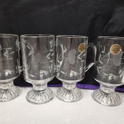 Tempered Crystal Glasses. Four beautiful glasses. Made in France. Exclusively for Princess House, tempered. Like new. Height 5 1/2 in, Width 2 3/4 in.