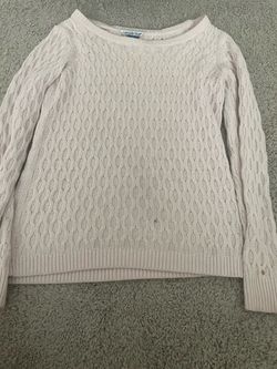 Pink knitted sweater