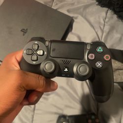 Two Sony PlayStation 4 Controllers