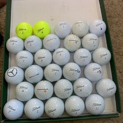 50 Golf Balls Titleist Prov1 And Prov1x In Good Conditions.