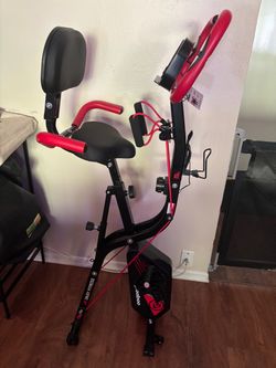 Red and black pooboo workout bike