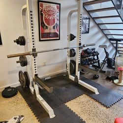 Halfrack, Olympic Bar(+), ~275lbs of Plates, and Mats