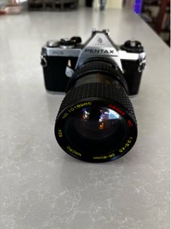 Vintage   Pentax 35 mm Camera  , with  Osawa  28-80mm lens , tested with  case .