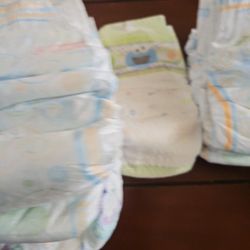 Lot Of Diapers, (Sizes 6, 5,4,  and 2)