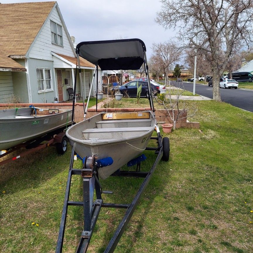 12' Aluminum Boat with Trailer and Johnson 4hp 2 Stroke needs tune-up 