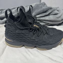 lebron 15 black and gold used size 11