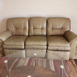 Leather reclining sofa and perfect condition