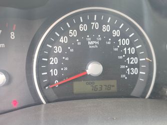2007 Kia Sedona  family  van low mileage  clean pink slip in hand it does owe tags 2 years working  on me paying  them off