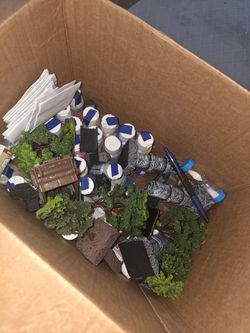 Mixed paints and fake mini trees for DIY art projects or DND maps