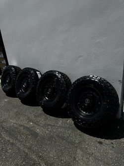 Black Rhino Arsenal 8x170 17” Wheels With 35” Toyo Open Country R/T PRO Tires