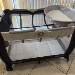 Graco Pack N Play With Changing Area And Raised Bassinet