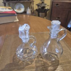 Two vintage glass cruits for oil and vinegar